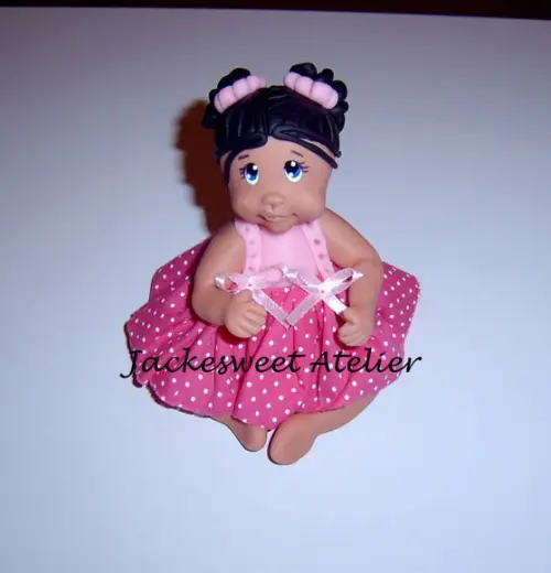 Boneca de vestido em biscuit