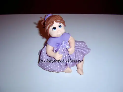 Boneca de vestido em biscuit