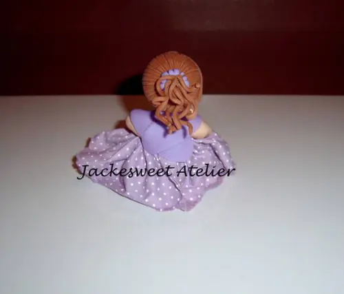 Boneca de vestido em biscuit