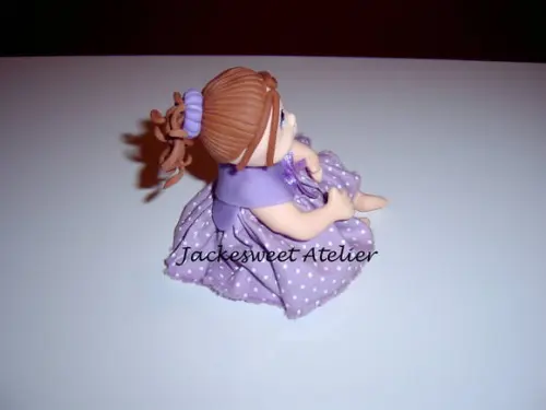 Boneca de vestido em biscuit