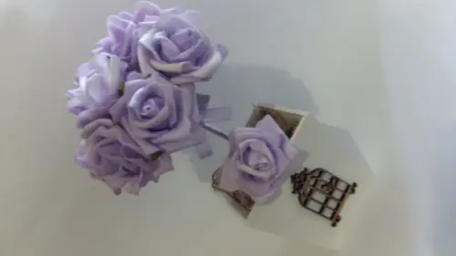 Centro de Mesa Rosas Lilás