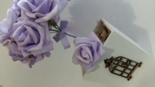 Centro de Mesa Rosas Lilás