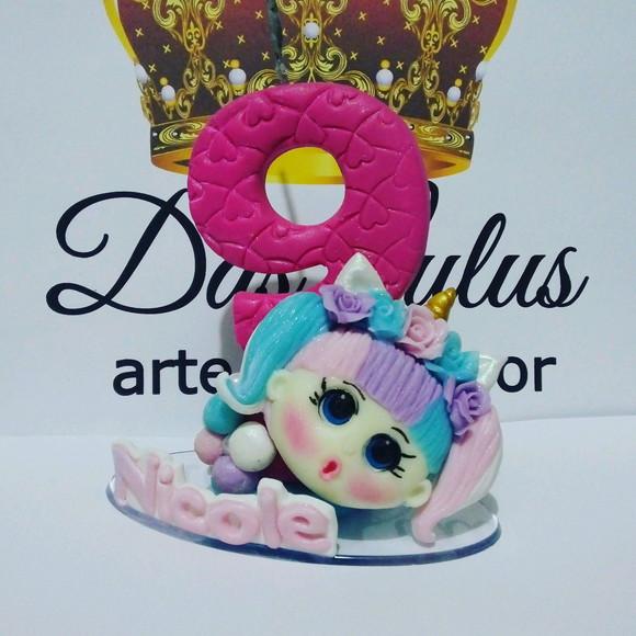 Vela boneca unicornio