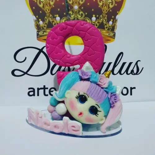 Vela boneca unicornio