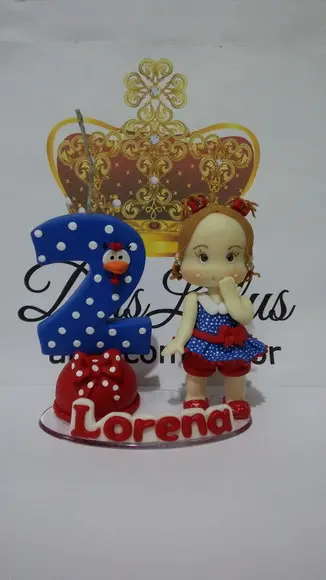 Vela com boneca galinha