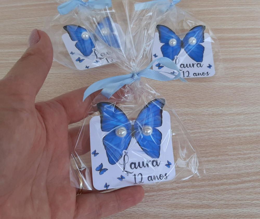 Tag com brinco borboleta azul