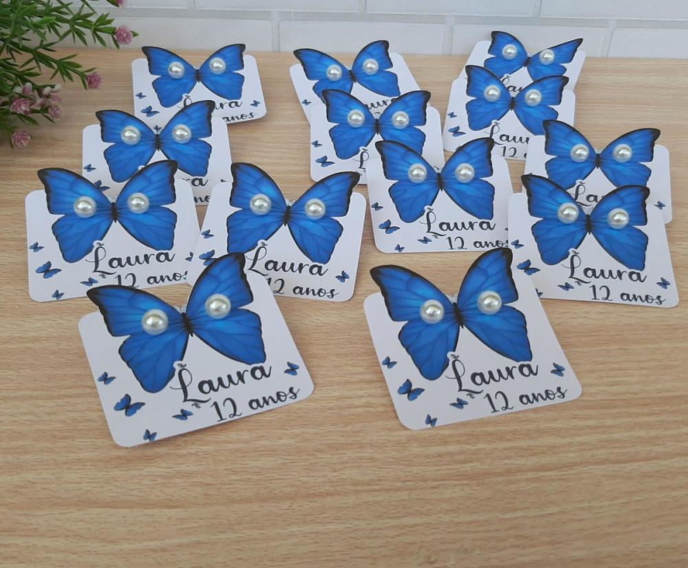 Tag com brinco borboleta azul
