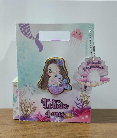 Sacolinha Surpresa 3 em 1 Tema Sereia Baby qlq. Tema.