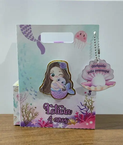 Sacolinha Surpresa 3 em 1 Tema Sereia Baby "qlq. Tema".