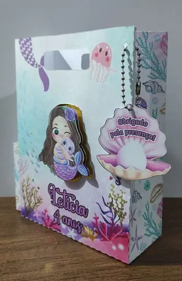 Sacolinha Surpresa 3 em 1 Tema Sereia Baby qlq. Tema.