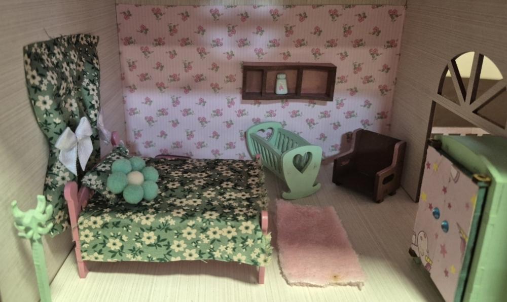 Casinha de boneca decorada com iluminação