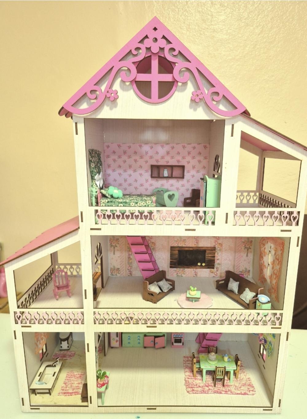 Casinha de boneca decorada com iluminação