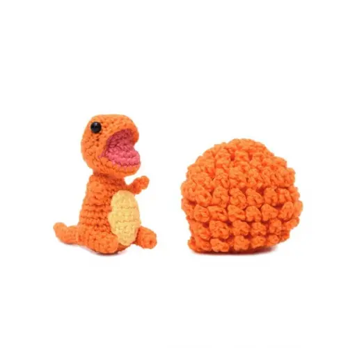 Ovo com Filhote de Dinossauro Laranja em Amigurumi