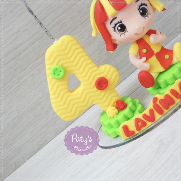 Topo com Vela Emília - Sítio do Pica-Pau Amarelo