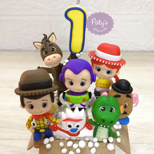 Topinho com Vela Toy Story na caixa de brinquedos