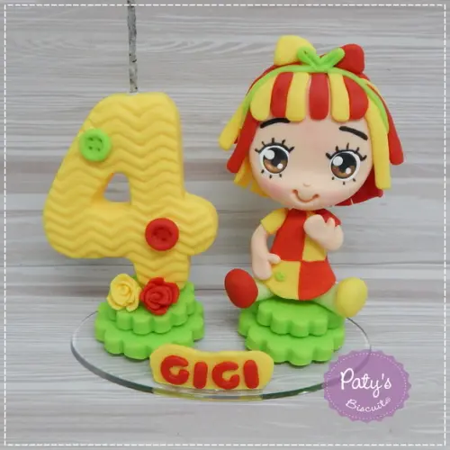 Topo com Vela Emília - Sítio do Pica-Pau Amarelo