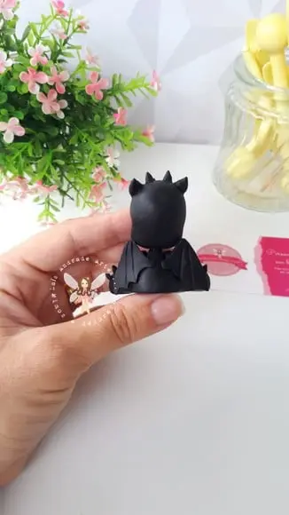 Aplique de como treinar o seu Dragão Banguela em biscuit