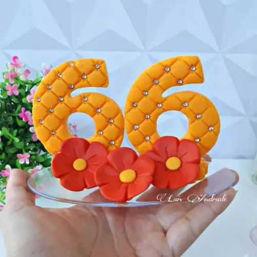 Vela 66 anos feita em biscuit