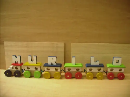 Trenzinho com nome multicolorido