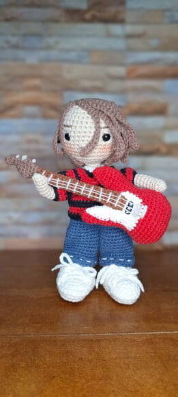 Boneco guitarrista