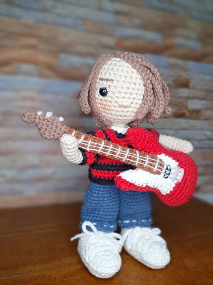 Boneco guitarrista