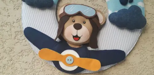 Guirlanda e Porta Retraro Urso Aviador