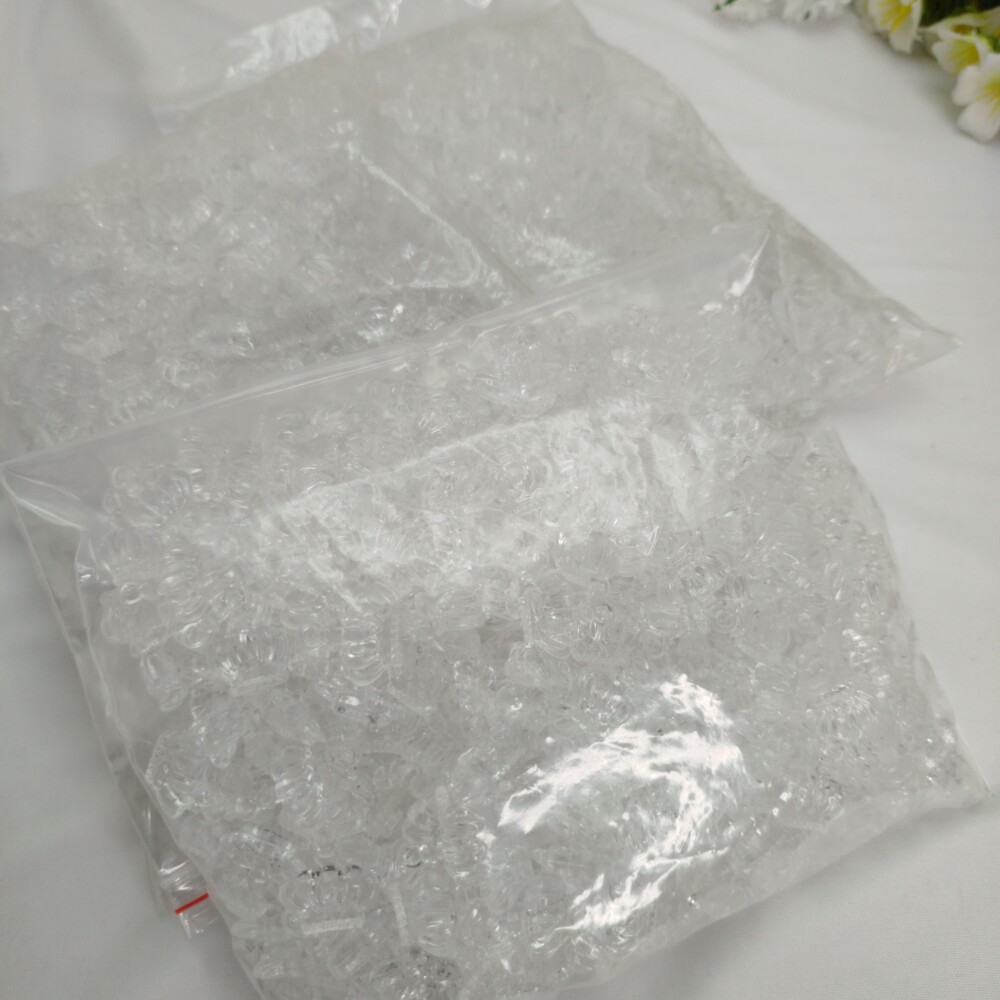 Pingente Coroa em Acrilico Transparente - aprox. 500 gramas
