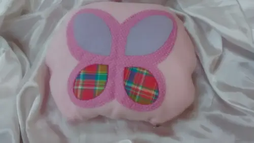 Manta de bebê que transforma em almofada
