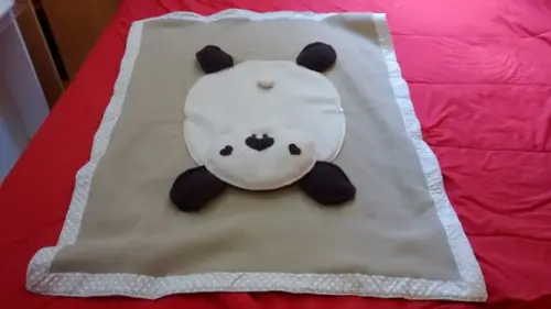 MANTA BEBÊ QUE TRANSFORMA ALMOFADA DE UR