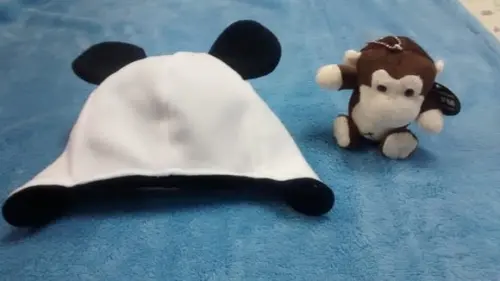 Touca infantil com tapa orelhas PANDA