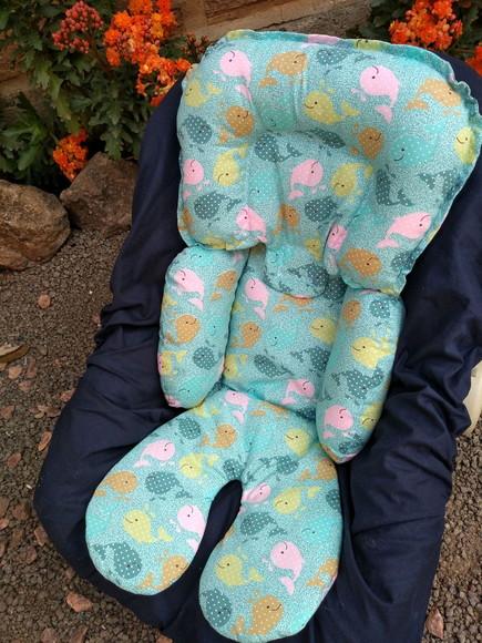 Redutor de Bebê Conforto.