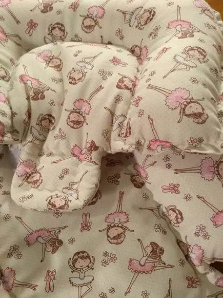 Almofada de bebê conforto.