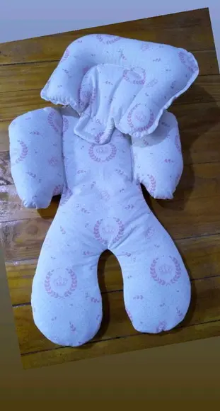 Almofada de bebê conforto.