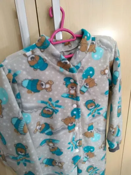 Macacão Pijama em Microsoft. (8 ou 10 anos)