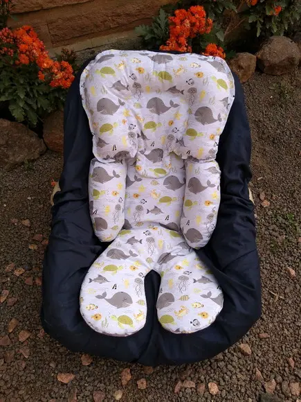Redutor de Bebê Conforto.