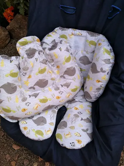 Redutor de Bebê Conforto.
