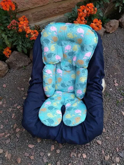 Redutor de Bebê Conforto.