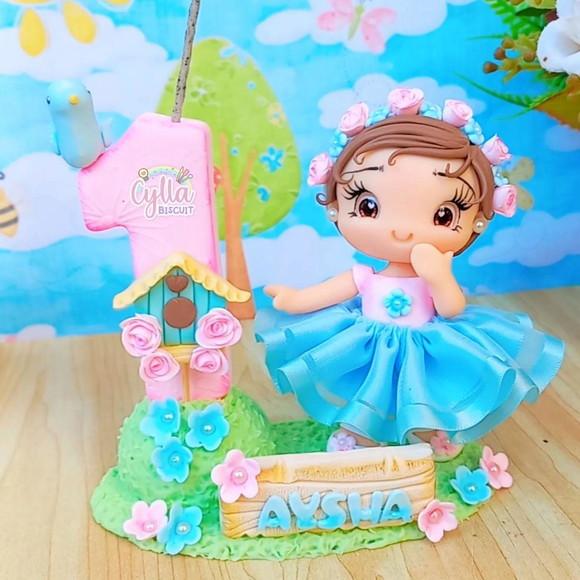 Vela Topo de Bolo Jardim em Biscuit