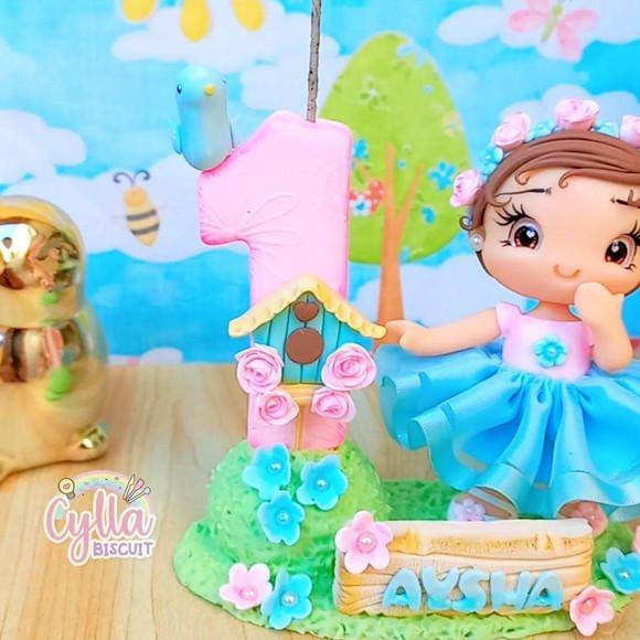 Vela Topo de Bolo Jardim em Biscuit