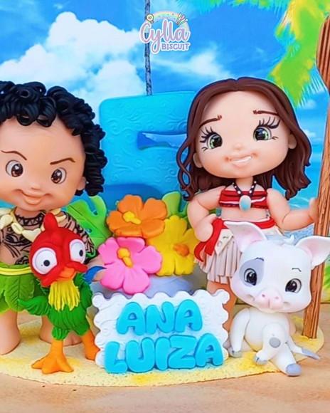 Vela Topo de Bolo Moana  e Maui em Biscuit