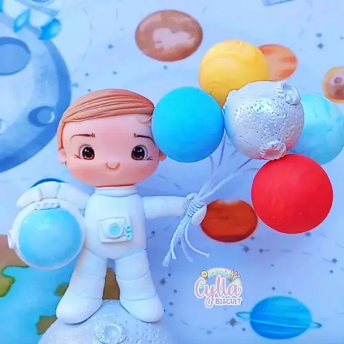 Vela Topo de Bolo Astronauta em Biscuit