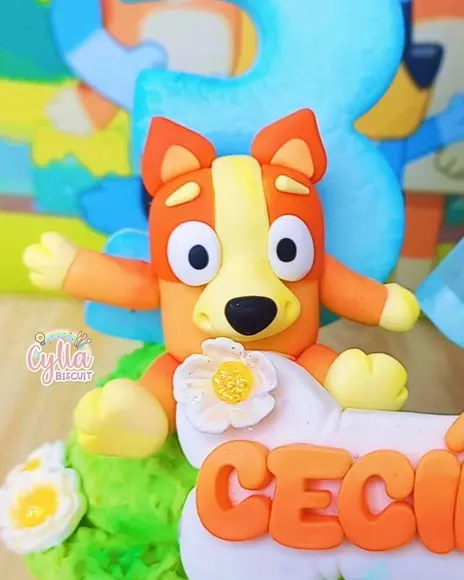 Vela Topo de Bolo Bluey e Pingo em Biscuit