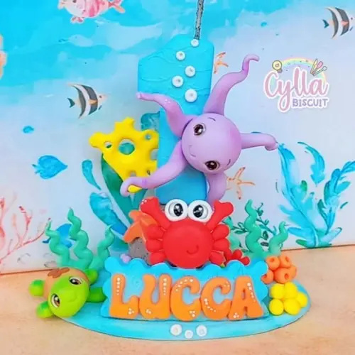 Vela Topo de Bolo Fundo do Mar em Biscuit