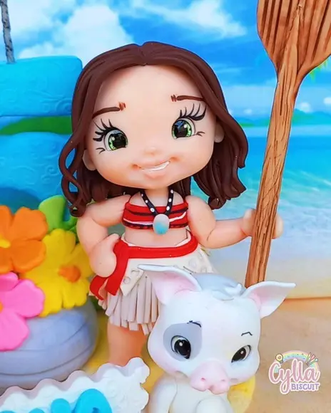 Vela Topo de Bolo Moana  e Maui em Biscuit
