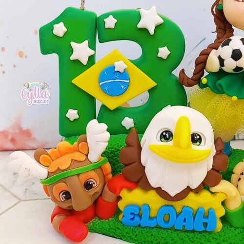 VELA TOPO DE BOLO PERSONALIZADO COPA MENINA EM BISCUIT