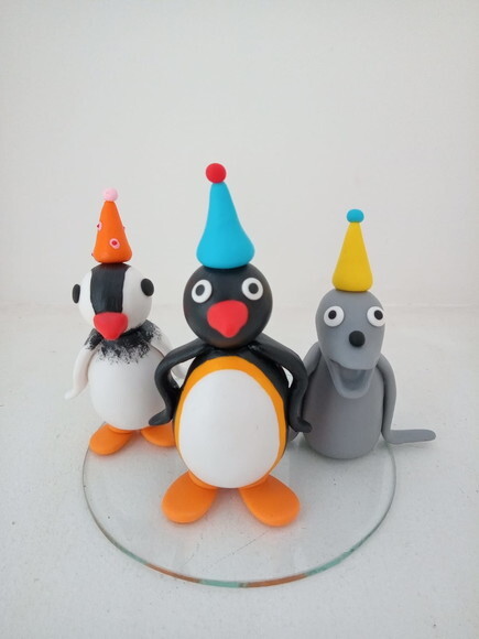 Topo de Bolo Pingu