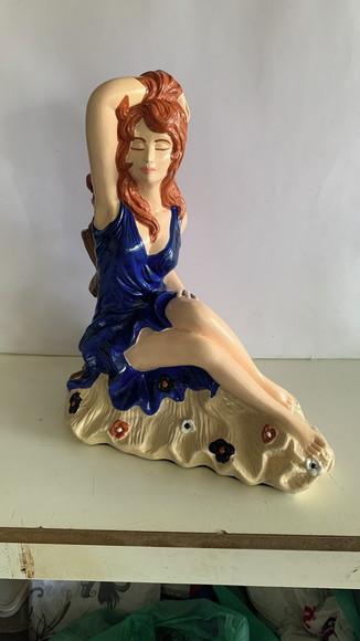 Pomba Gira Menina da Praia Imagem da Pomba Gira Sentada