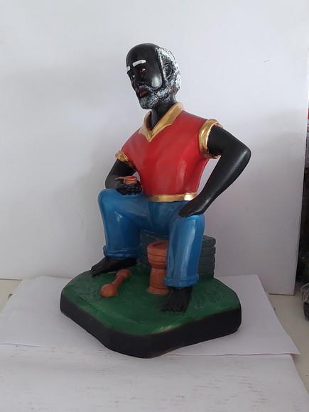 Preto Velho do Pilão Deitado Imagem Mestre do Pilão Deitado