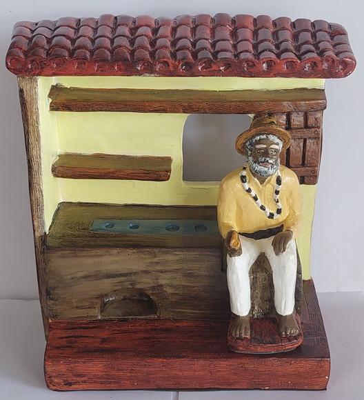 Preto Velho na Casinha Imagem de Preto Velho Dentro Cozinha
