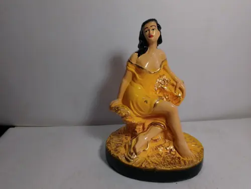 Cigana do Ouro Sentada Imagem da Cigana Ouro Sentada